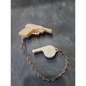 VINTAGE PISTOL SHAPE PLASTIC WHISTLE (MADE IN USA PAT PEND)